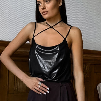 Summer fashion design sense off-the-shoulder sling U-neck slim slim black vest European and American reflective cloth foreign trade women