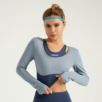 The new quick-drying slim sports fitness clothes in the cross-border zone are shockproof and color-blocked fake two bra-free yoga clothes